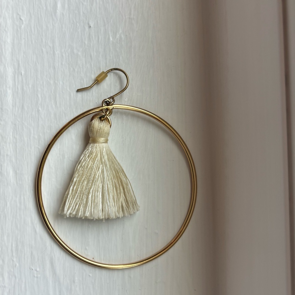 J Crew gold hoops with cream colored tassels